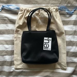 NWT! home of hai little silk bag in black